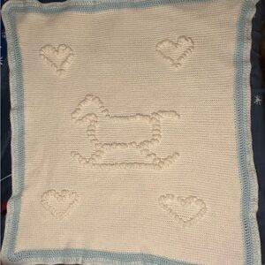 Cute baby Afghan. White and baby blue. 38" x 43".
